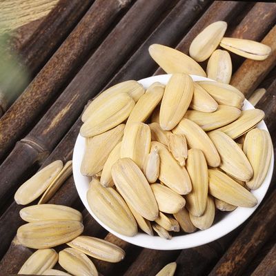 الصينية الرخيصة السعر الساخن بيع قشرت بيضاء المُميزة الملحّة حبوب عباد الشمس الأمازون بيع الساخن